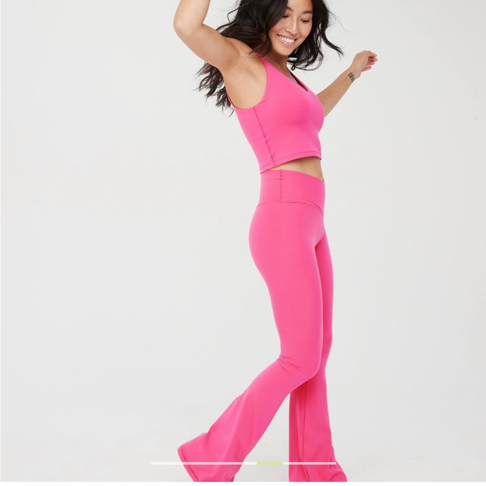 Two VG size medium long length OFFLINE Aerie Real Me Flare twist front leggings